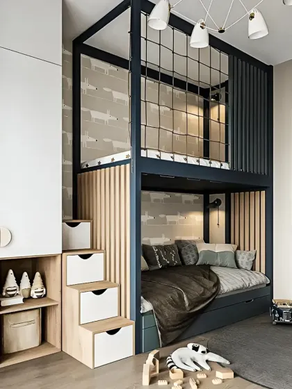 For this child's bedroom, we maximized a compact space with a custom-built loft bed. The design includes integrated drawers in the stairs for smart storage, a cozy lower bunk, and a safe, enclosed upper bunk with a playful rope detail, creating a fun and functional room.