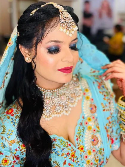 A close-up of the dramatic blue smoky eye. This is a great example of how I can incorporate color into a look in a sophisticated way.