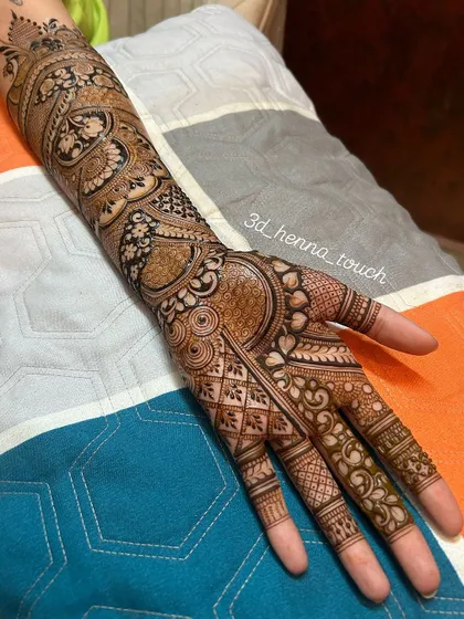 A full-arm bridal design showcasing a variety of techniques. From paisleys and florals to intricate line work, this design is a testament to detailed craftsmanship.