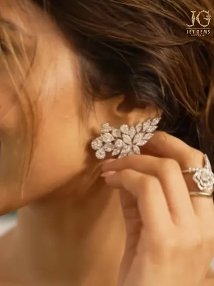 A closer look at the magnificent diamond ear cuffs worn by Sreeleela, designed to climb the ear for a modern and glamorous statement.