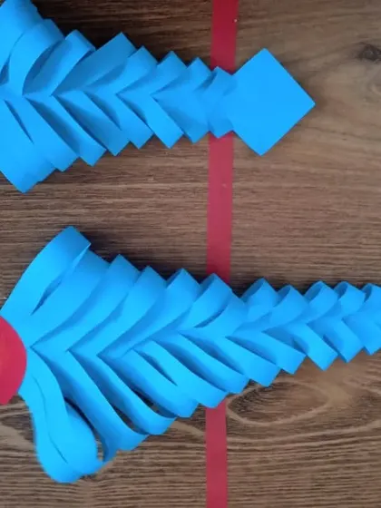 These intricate paper fish were a highlight of our summer camp craft activities. The precise folding and cutting required for this project helped the children develop their concentration and fine motor skills.