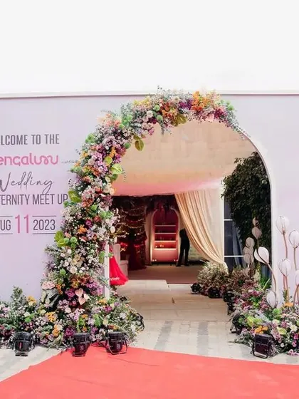 The grand entrance to the BWF 2023 meetup. A lush floral arch welcomed over 500 industry mavens to an evening of networking and collaboration.