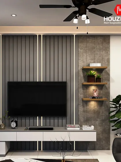 This TV unit uses a combination of grey textured panels and vertical light strips to create a sophisticated ambiance. Floating wooden shelves provide a warm contrast and space for decor.