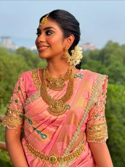 A three-quarter profile, capturing her elegance and the details of her look.