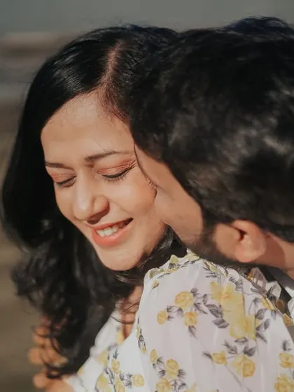The pure joy of a candid moment. This close-up from Sanket and Apeksha's Goa shoot is a perfect example of the fun, relaxed, and candid couple photography we specialize in.