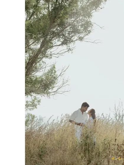 A duplicate of ID 18, this photo uses a soft-focus and bright exposure to create a beautiful, dreamlike portrait of a couple in a field.
