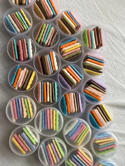 An overhead shot of many travel soap packs ready to go. These are perfect for party favors or for trying out a variety of my soaps.
