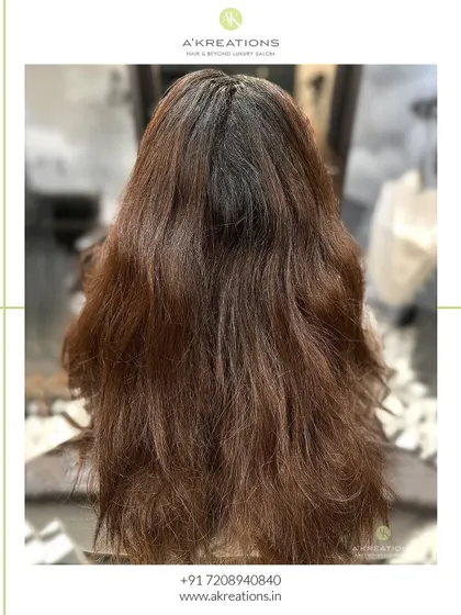 The "before" shot of a client ready for a sweet and sophisticated chocolate brown hair transformation.
