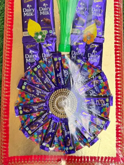 The base of our grand chocolate mala features a beautiful wheel of chocolates, making it look as good as it tastes.