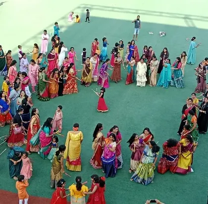 An aerial view of our Dandiya event, where mothers and their children danced together in beautiful ethnic attire, strengthening our community bonds.
