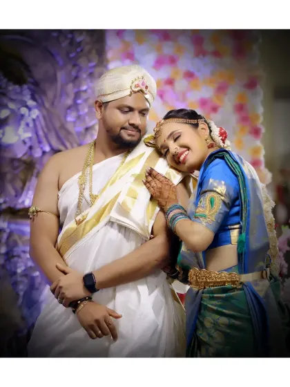 A tender moment where the bride rests her head on the groom's shoulder, a beautiful candid shot from their wedding day.