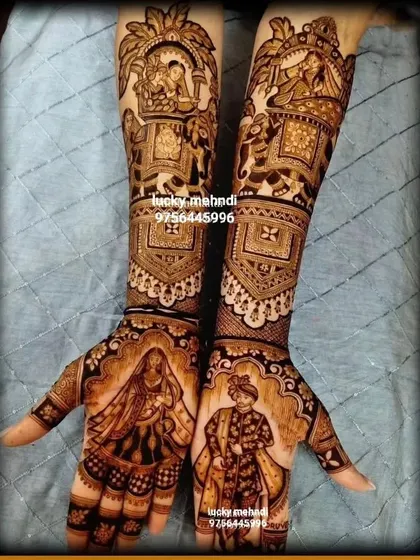A royal-themed bridal design with bride and groom portraits on the palms. The arms feature a 'baraat' scene with elephants and a 'doli' scene.