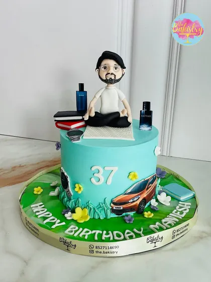 A cake that’s as unique as Maniesh himself. For his 37th birthday, I created this personalized masterpiece featuring his favorite things, including his car and a custom 3D fondant topper of him meditating.