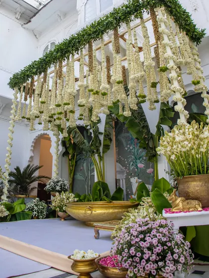 A side view of the floral canopy, showing the intricate construction and the sheer volume of flowers used to create this stunning effect.