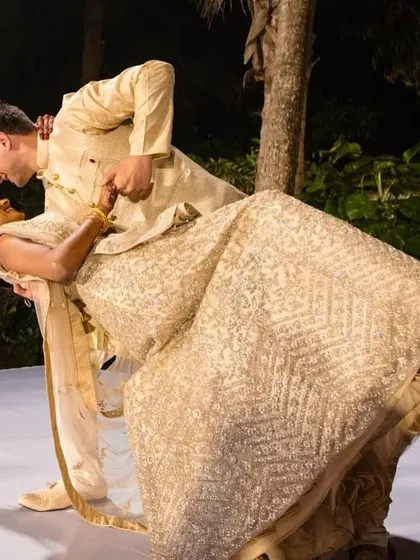 A repeat of the stunning dip, emphasizing this key romantic moment in their destination wedding dance.
