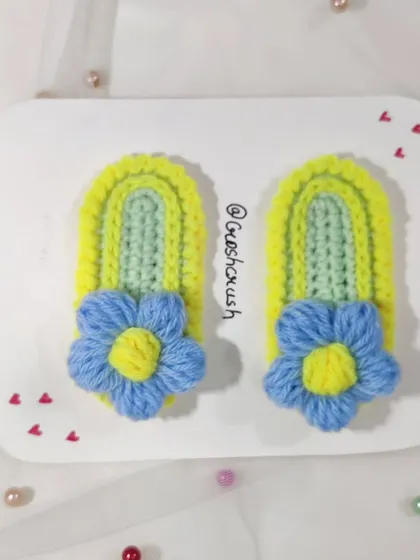 Korean-style flower hairclips with a two-tone design of light green, yellow, and blue.