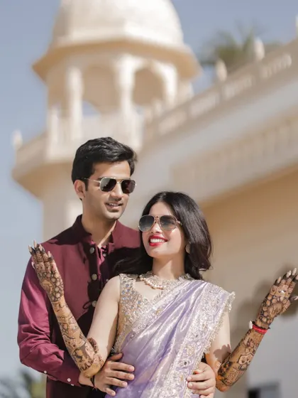 Another angle of the stylish couple enjoying their Mehndi function in Jaipur.