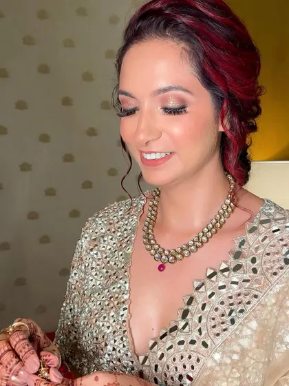 The prettiest smile on this lovely client. We did a soft glam look with a focus on shimmery eyelids and glowing skin, which looks beautiful with her red hair.