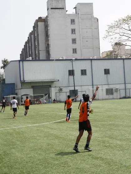 A player celebrates after scoring during a trial match. We love to see the passion and confidence that drives our athletes to succeed.