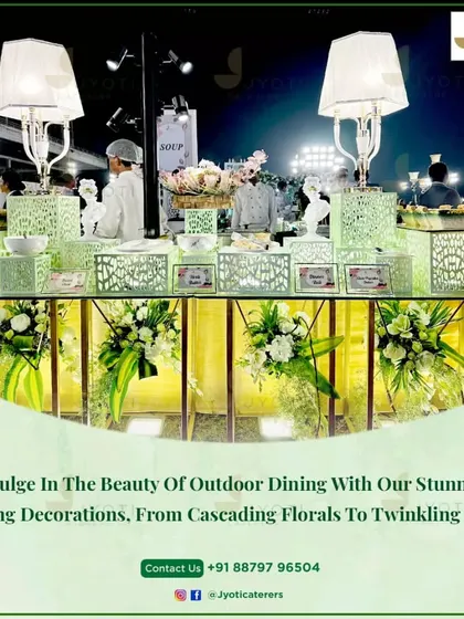 A beautiful outdoor soup station with intricate light green counters and elegant table lamps, blending seamlessly with the surrounding nature.