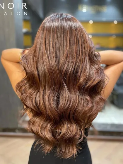 A Friday feature showcasing a stunning hair colour. The rich tones and healthy shine are the result of expert application and premium care.