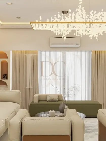 Another perspective of the living room, highlighting the custom-designed display unit and the elegant console table. We believe every piece of furniture should be both beautiful and functional.