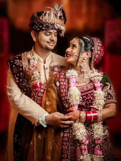 A perfectly composed couple portrait showcasing their regal wedding attire. Our goal is to create timeless images that you will cherish forever.