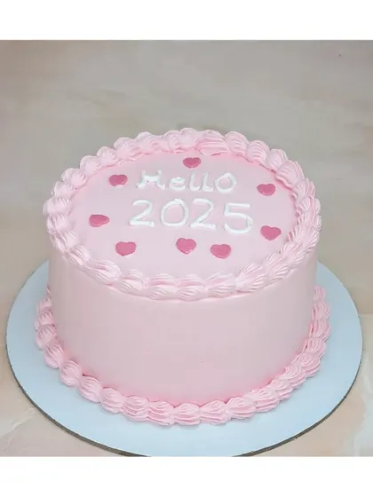 A simple pink cake for the New Year. This fresh pineapple cake says "Hello 2025" and is perfect for a small, hopeful celebration.