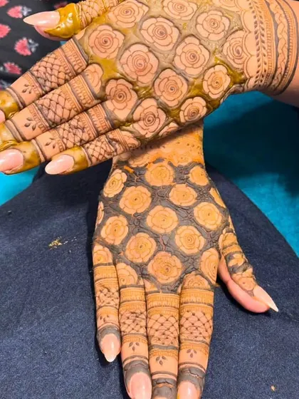 A unique design with a grid of roses on one hand and a dark, filled floral pattern on the other.