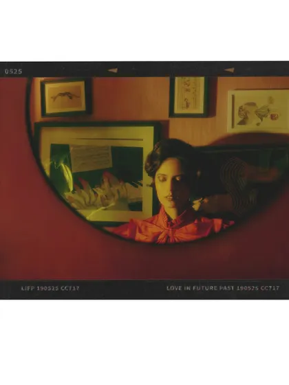 Another film-strip style image, capturing a moment of reflection in a mirror. This framing device emphasizes the feeling of watching one's own life unfold as if in a movie.