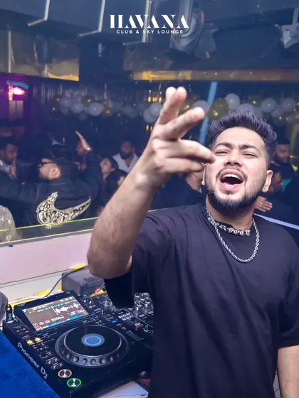 A candid shot of me interacting with the crowd from the DJ booth at Havana.