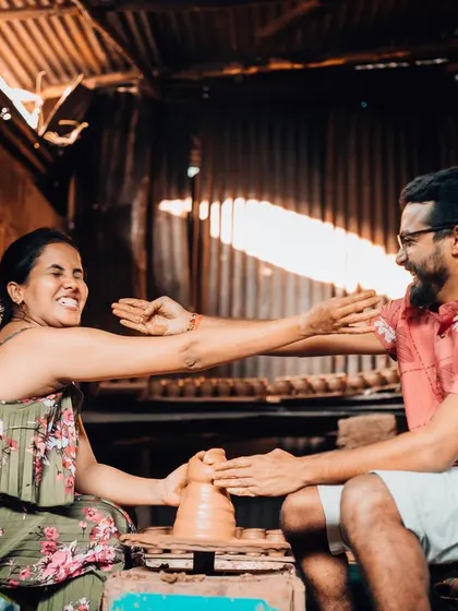 A joyful, interactive pre-wedding activity with the couple trying their hand at pottery. This type of session creates genuine smiles and fun memories.