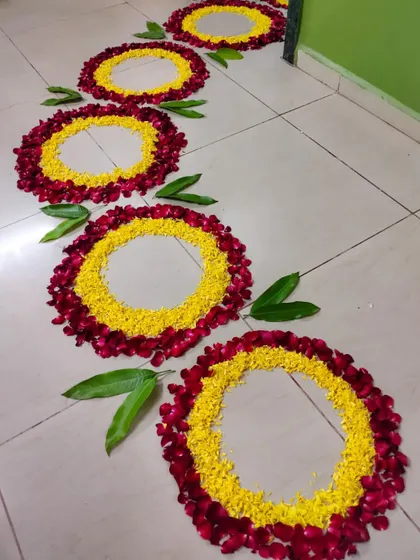 A closer look at the floral rangoli circles I designed for a bride's 'Griha Pravesh'. It's a simple, beautiful, and traditional way to welcome a new family member.