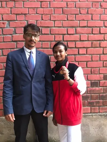 One of my students, Hithashree, proudly showing her bronze medal from the district-level championship. Every achievement, big or small, is a step towards greater confidence.