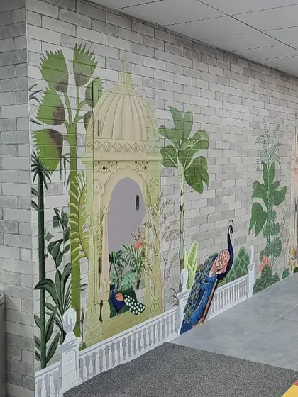 Another angle of the Providence cafeteria mural, highlighting the detailed painting of the Mughal-style gazebos and lush greenery.