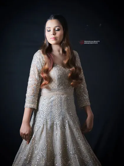Sometimes all it takes is a little makeup magic to feel unstoppable. This elegant look in a shimmering gown is perfect for a formal event, with soft, glamorous makeup to match.
