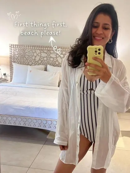 First things first on any Goa trip: beach please. A classic striped monokini paired with a simple white shirt cover-up is my go-to for a day by the sea.