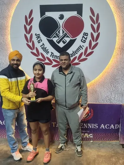 Akanksha Singhal, our U-17 Girls Gold Medalist, proudly displays her trophy at the JKG Open.