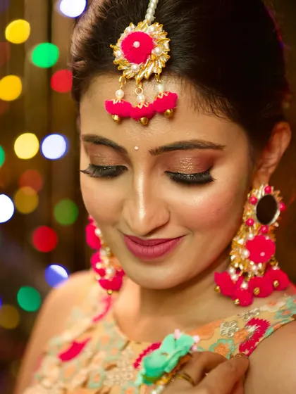 A close-up showcasing the delicate sparkle on the eyelids and the soft, blended quality of the makeup. This minimal yet radiant style is perfect for brides who prefer a less-is-more approach.