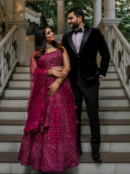 A stunning reception look at the Taj Westend. We use dramatic lighting and elegant backdrops to create sophisticated and timeless portraits for your evening events.