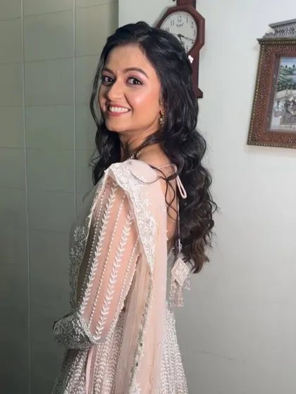 A happy and radiant bride-to-be. The soft glam look enhances her natural beauty without being overpowering.