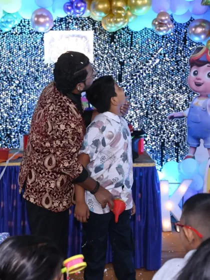 The classic paper-pulling gag is always a highlight. This young man was a great sport and his reaction had the entire audience at this birthday party in stitches.