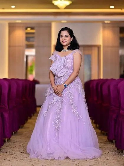 My client looks absolutely stunning in this lavender gown. The ruffled detail on the bodice is one of my favorite design elements.