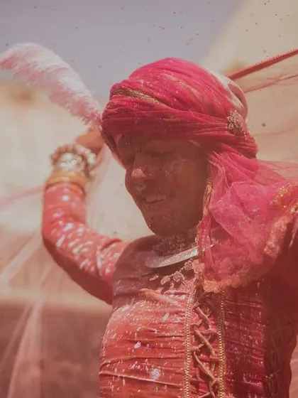 A vibrant collection of images from the Holi celebrations in Braj, specifically Nandgaon. This series captures the pure ecstasy of the festival, with portraits of devotees, men dressed as gopis, and crowds dancing in a cloud of colors.