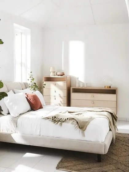 A full view of a bedroom featuring the Crème collection. The bed, with its simple elegance and soft, earthy palette, transforms the space into a serene and minimalistic oasis.