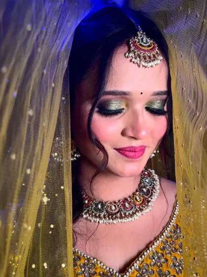 A close-up of the eye makeup for this party look. I used a beautiful green shimmer on the lids to create a dramatic effect that looks stunning under the lights.