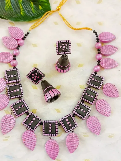 More color variations of the popular square and leaf necklace, including pink, and another view of the black and gold, showing the depth of my inventory.