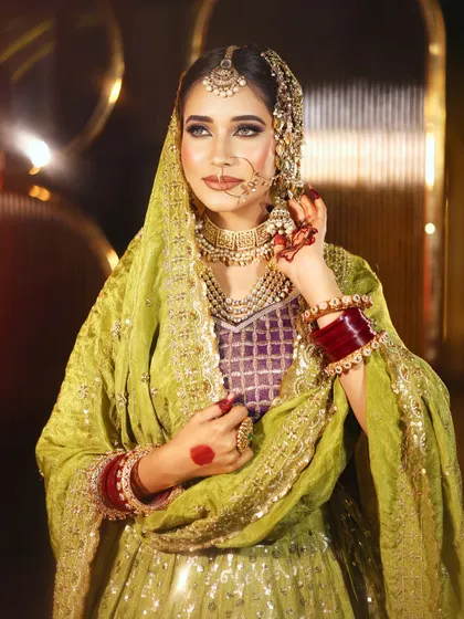Another angle of this stunning Walima look, showcasing the intricate jewelry and the way the makeup complements the entire ensemble.