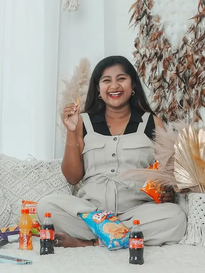 This fun-loving couple chose a casual, playful theme with snacks, showing a different and very real side of the pregnancy journey.