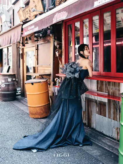 Published in Figgi Magazine, this shot was taken on the streets of Shimbashi, Japan. We contrasted a high-fashion gown with a raw, urban environment.